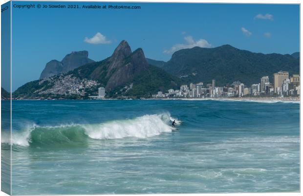 Surfing in Rio Canvas Print by Jo Sowden