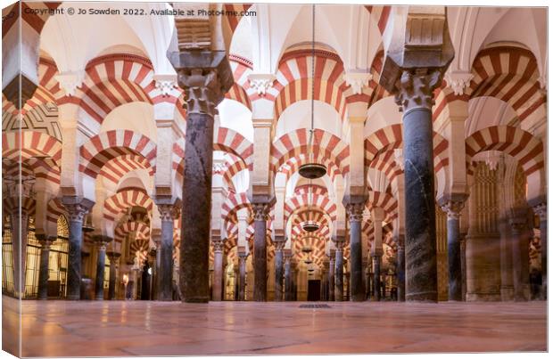 The arches of the Cordoba Mezquita Canvas Print by Jo Sowden