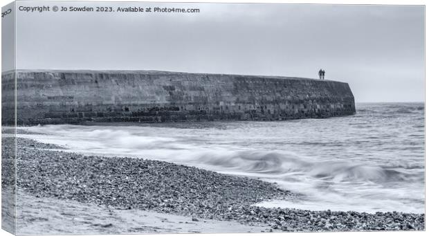 Walking along from the Cobb, Lyme Regis Canvas Print by Jo Sowden