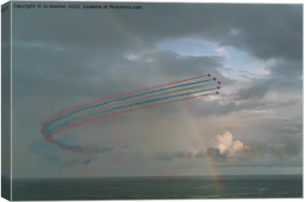 Red Arrows through the Rainbow Canvas Print by Jo Sowden