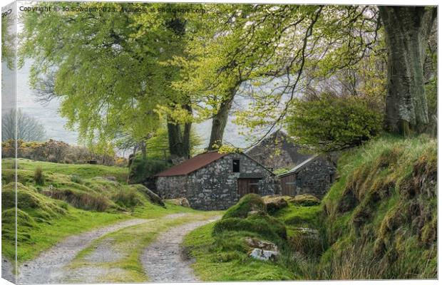 Traditional Dartmoor stone cottage Canvas Print by Jo Sowden