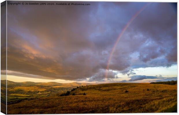 Rainbow over the Brecon Beacons Canvas Print by Jo Sowden