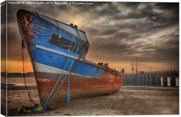  Old rusty ship being broken for scrap Canvas Print by clifford Spittle