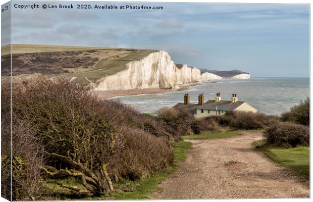 Seven Sisters and the Coastguard Cottages Canvas Print by Len Brook