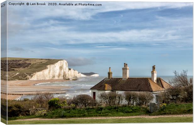 The Seven Sisters and the Coastguard Cottages Canvas Print by Len Brook