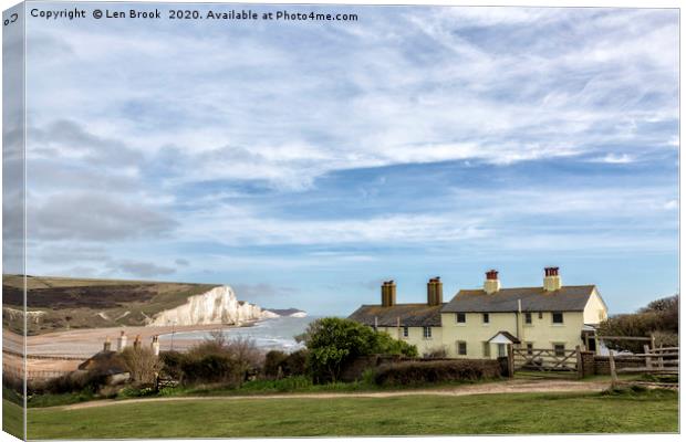 The Seven Sisters and the Coastguard Cottages Canvas Print by Len Brook