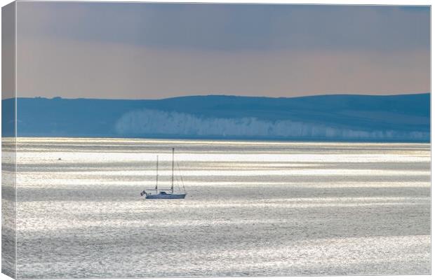 sailing boat at rest on a calm sea  Canvas Print by tim miller