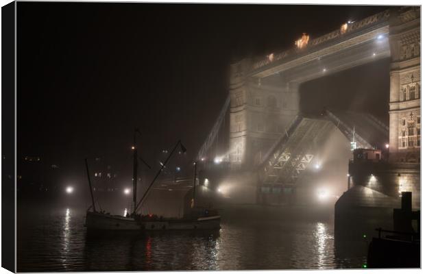  Tower Bridge at night in fog Canvas Print by tim miller