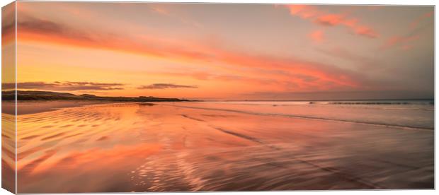 Warm glow of beautiful Bamburgh Canvas Print by Naylor's Photography