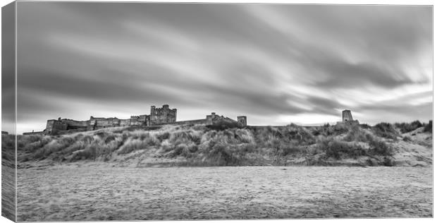 The Magnificent Bamburgh Castle in Mono Canvas Print by Naylor's Photography