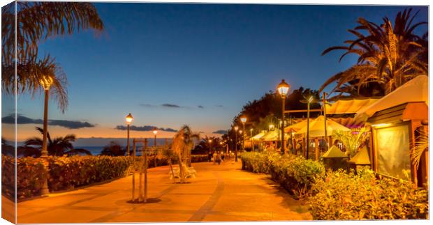 Ocean walk past Cafe's and Restaurants Canvas Print by Naylor's Photography