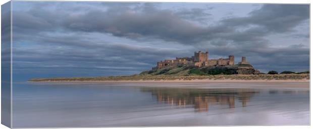 Bamburgh Castle twilight blue Canvas Print by Naylor's Photography