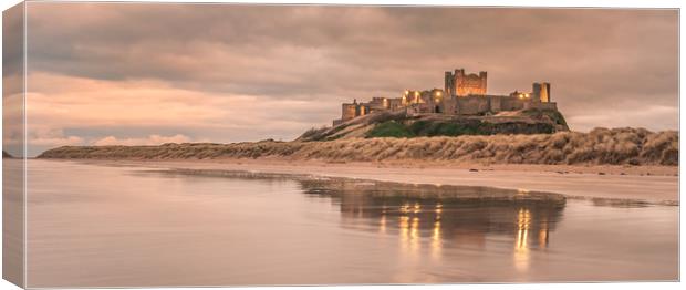 Time to reflect at Bamburgh Castle Canvas Print by Naylor's Photography