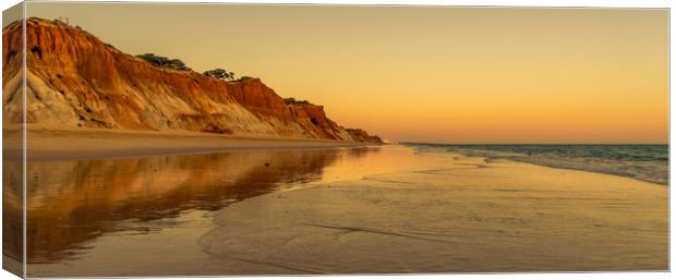 Sunset and red rocks Praia da Falesia Canvas Print by Naylor's Photography