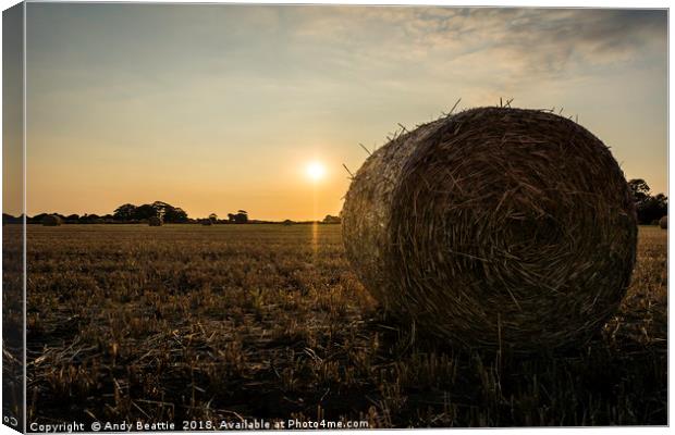 Hay Bale Sunset Canvas Print by Andy Beattie