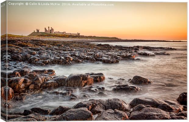 Dunstanburgh Castle, Northumberland Canvas Print by Colin & Linda McKie