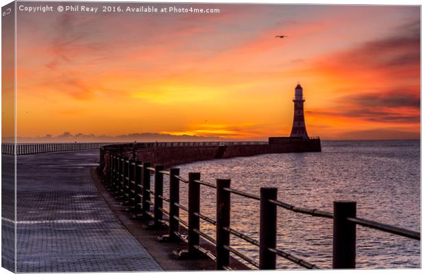 Sunrise at the pier Canvas Print by Phil Reay
