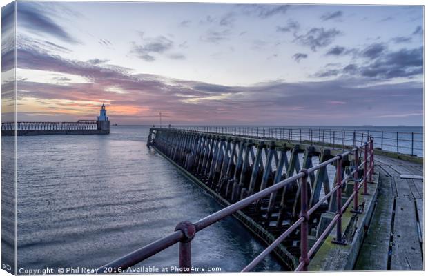 The Blyth piers at sunrise Canvas Print by Phil Reay