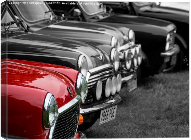  A red mini with others Canvas Print by christopher gould