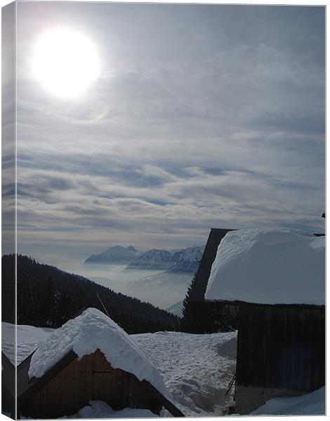 Crest-Voland France, sunny day above the clouds. Canvas Print by Ian Small