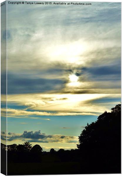  clouds nearing sunset Canvas Print by Tanya Lowery