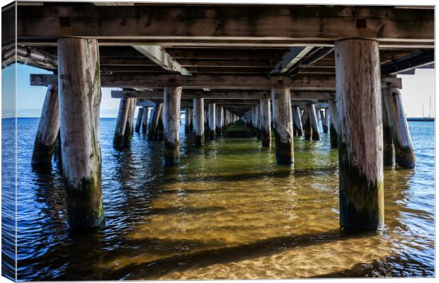 Under Sopot Pier on Baltic Sea in Poland Canvas Print by Artur Bogacki