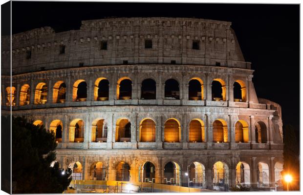 Colosseum in Rome at Night Canvas Print by Artur Bogacki