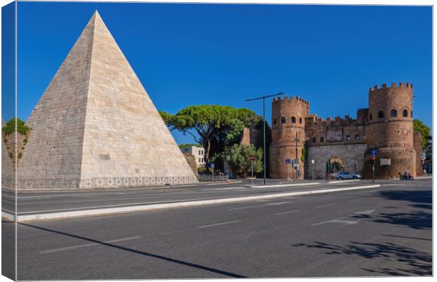 Pyramid of Cestius and San Paolo Gate in Rome Canvas Print by Artur Bogacki