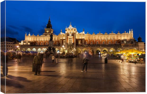 Sukiennice at Night in City of Krakow Canvas Print by Artur Bogacki