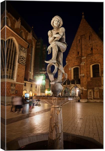 Student Statue at Night in Krakow Canvas Print by Artur Bogacki
