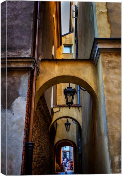 Narrow Passage in Old Town of Warsaw in Poland Canvas Print by Artur Bogacki