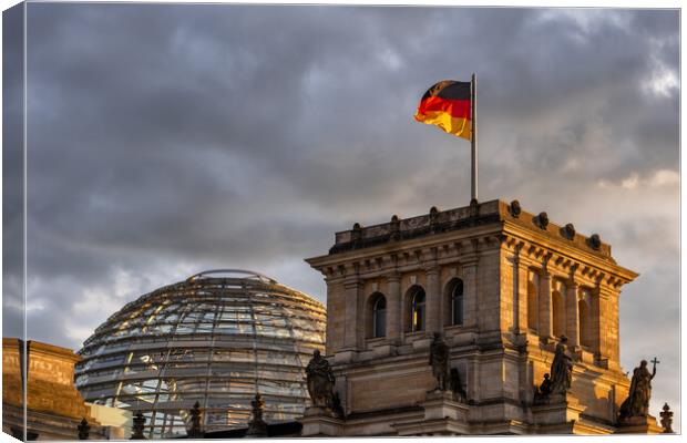 Reichstag Dome And Flag Of Germany In Berlin Canvas Print by Artur Bogacki