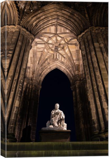 Scott Monument And Statue At Night In Edinburgh Canvas Print by Artur Bogacki