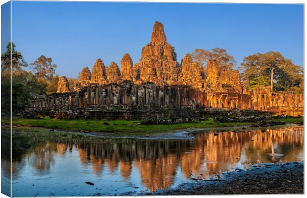 Bayon Temple At Sunset In Cambodia Canvas Print by Artur Bogacki