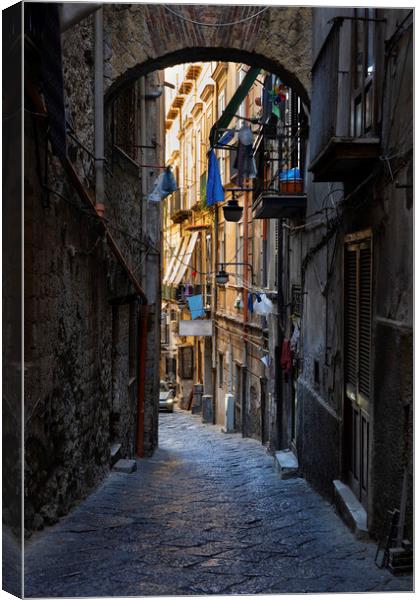 Narrow Street in Naples Canvas Print by Artur Bogacki