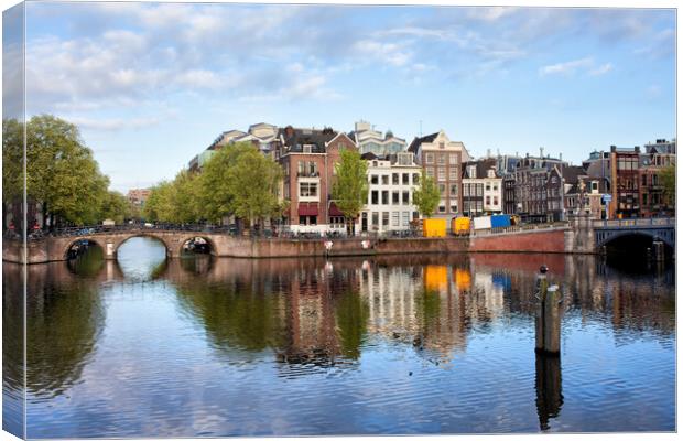 Amstel River in the City of Amsterdam Canvas Print by Artur Bogacki