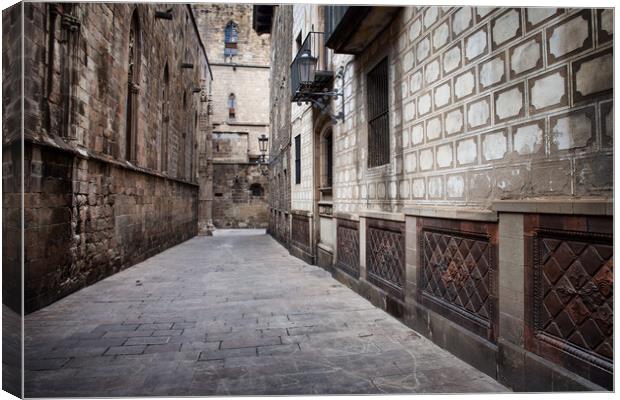 Alley in the Gothic Quarter of Barcelona Canvas Print by Artur Bogacki