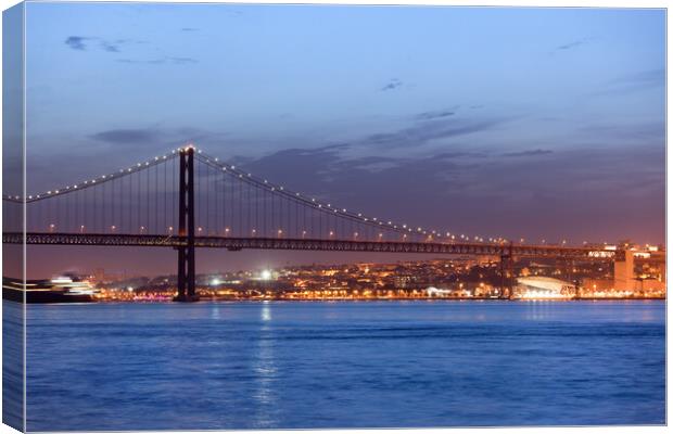 25th of April Bridge at Night in Lisbon Canvas Print by Artur Bogacki