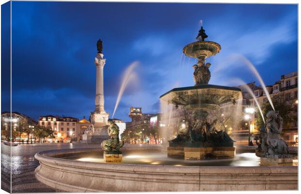 Fountain on Rossio Square in Lisbon by Night Canvas Print by Artur Bogacki