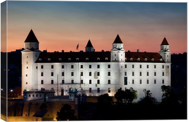 Bratislava Castle Illuminated at Dusk in Slovakia Canvas Print by Artur Bogacki