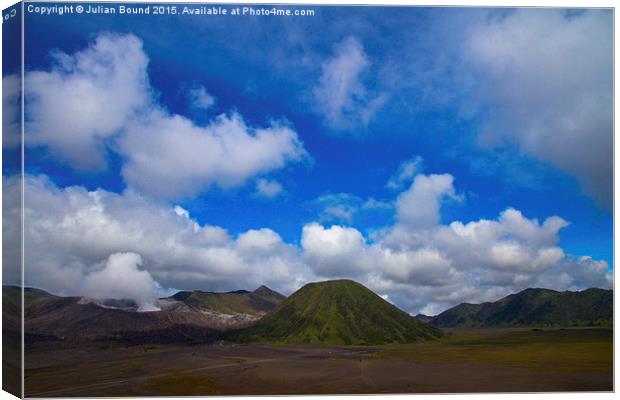 Blue skies over Bromo volcano, Indonesia Canvas Print by Julian Bound