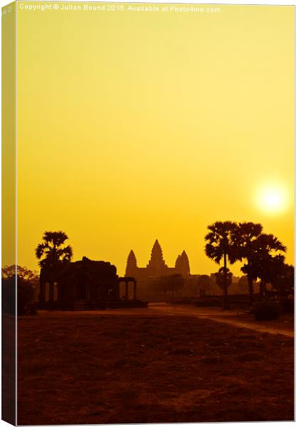 Sunrise over Angkor Wat, Siem Reap, Cambodia Canvas Print by Julian Bound