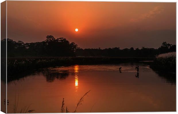 A beautiful Sunset and its reflection in water Canvas Print by Shreeram Khatri
