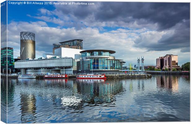  Salford Quays theatre and The Lowry. Canvas Print by Bill Allsopp