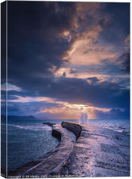 Cobb and clouds. Canvas Print by Bill Allsopp