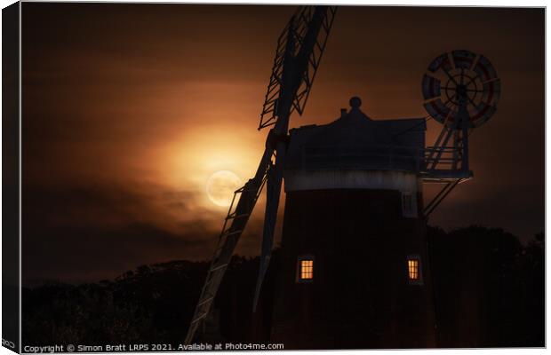 Cley windmill and harvest moon at night in Norfolk Canvas Print by Simon Bratt LRPS
