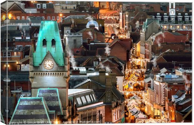 Winchester City night view at Christmas Canvas Print by Simon Bratt LRPS