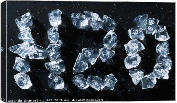 H2O water symbol written in ice cubes and melting Canvas Print by Simon Bratt LRPS