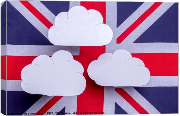 British flag with three white clouds floating abov Canvas Print by Simon Bratt LRPS