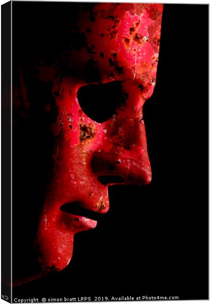 AI robotic face profile close up rusty red Canvas Print by Simon Bratt LRPS